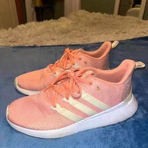 Women’s pink adidas tennis shoes size 10. Barely worn.